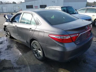 2015 Toyota Camry Hybrid LE with VIN 4T1BD1FK5FU164384, listed as a IAAI auction lot 41704922 with 122,132 mi miles. Bid and sale history available at carsss.com. Image 3.