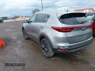 2020 Kia Sportage S with VIN KNDP6CAC9L7703731, listed as a IAAI auction lot 41951027 with 76,771 mi miles. Bid and sale history available at carsss.com. Image 3.