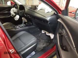 2024 Mazda CX-30 S Preferred with VIN 3MVDMBCM7RM685929, listed as a IAAI auction lot 41574303 with 7,928 mi miles and . Bid and sale history available at DreamBid. Image 5.