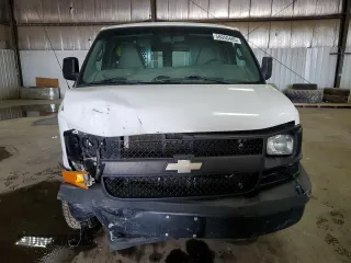 2016 Chevrolet Express Cargo with VIN 1GCWGAFF3G1290682, listed as a Copart auction lot 58050485 with 276,257 mi miles and Salvage title. Bid and sale history available at DreamBid. Image 5.