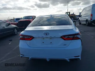 2023 Toyota Camry SE z VIN 4T1G11AK4PU148829, wystawiony jako IAAI lot #42250792 z przebiegiem 23 322 mil mil oraz . Historia ofert i sprzedaży dostępna na DreamBid. Obrazek 16.