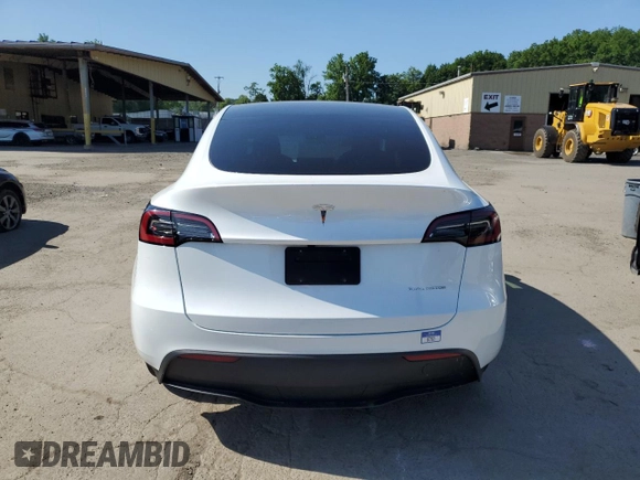 2024 Tesla Model Y Long Range с VIN 7SAYGDEE2RA257279, выставлен на аукционе Copart как лот 61248255 с пробегом Не указан миль и Списание • Salvage title. История ставок и продаж доступна на DreamBid. Изображение 6.