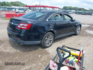 2013 Ford Taurus Limited z VIN 1FAHP2F85DG103747, wystawiony jako IAAI lot #42763099 z przebiegiem 181 891 mil mil oraz . Historia ofert i sprzedaży dostępna na DreamBid. Obrazek 4.