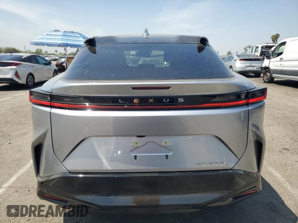 2025 Lexus RZ 300e Premium z VIN JTJABABB3SA007988, wystawiony jako Copart lot #54241965 z przebiegiem 2 633 mil mil oraz Szkoda całkowita • Salvage title. Historia ofert i sprzedaży dostępna na DreamBid. Obrazek 6.