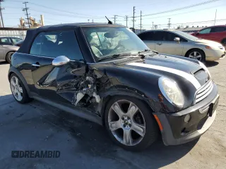 2005 MINI Convertible S z VIN WMWRH33415TF80610, wystawiony jako Copart lot #52642865 z przebiegiem 82 141 mil mil oraz Szkoda całkowita • Salvage title. Historia ofert i sprzedaży dostępna na DreamBid. Obrazek 4.