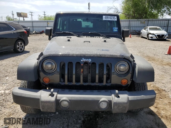 2013 Jeep Wrangler Sport with VIN 1C4AJWAG7DL670990, listed as a Copart auction lot 49910235 with 109,892 mi miles and Salvage Title. Bid and sale history available at carsss.com. Image 5.
