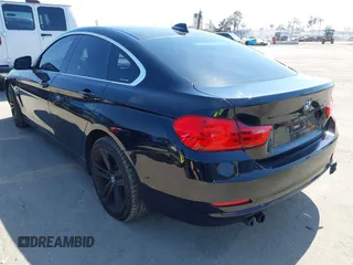 2016 BMW 4 Series 428i xDrive z VIN WBA4C9C58GG141210, wystawiony jako IAAI lot #42218036 z przebiegiem 88 864 mil mil oraz . Historia ofert i sprzedaży dostępna na DreamBid. Obrazek 3.