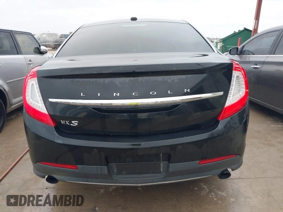 2013 Lincoln MKS EcoBoost with VIN 1LNHL9FT2DG604724, listed as a IAAI auction lot 41428420 with 152,880 mi miles and . Bid and sale history available at DreamBid. Image 16.