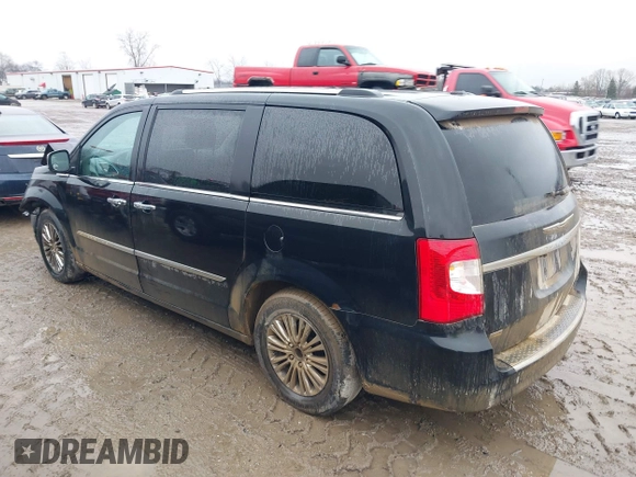 2011 Chrysler Town & Country Limited with VIN 2A4RR6DGXBR653039, listed as a IAAI auction lot 41217531 with 155,981 mi miles. Bid and sale history available at carsss.com. Image 3.