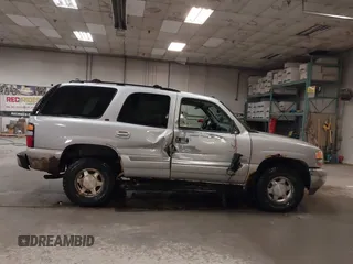 2004 GMC Yukon SLT with VIN 1GKEK13TX4J155865, listed as a IAAI auction lot 41758663 with 281,531 mi miles. Bid and sale history available at carsss.com. Image 13.