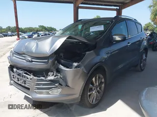 2014 Ford Escape SE z VIN 1FMCU0G97EUE34174, wystawiony jako IAAI lot #42274846 z przebiegiem 121 801 mil mil oraz . Historia ofert i sprzedaży dostępna na DreamBid. Obrazek 2.
