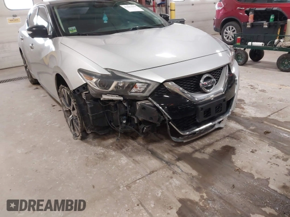 2016 Nissan Maxima SL with VIN 1N4AA6AP6GC384851, listed as a IAAI auction lot 41663659 with 127,247 mi miles and . Bid and sale history available at DreamBid. Image 6.
