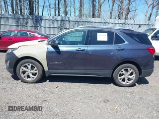 2019 Chevrolet Equinox LT z VIN 3GNAXVEX8KL309330, wystawiony jako IAAI lot #42037575 z przebiegiem 97 948 mil mil oraz . Historia ofert i sprzedaży dostępna na DreamBid. Obrazek 14.