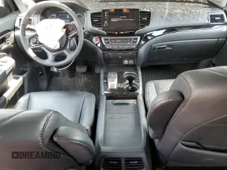 2020 Honda Pilot Touring 8-Passenger with VIN 5FNYF5H95LB021658, listed as a Copart auction lot 58878594 with 36,122 mi miles and Salvage Title. Bid and sale history available at DreamBid. Image 8.