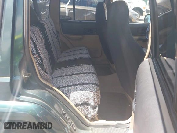 2000 Jeep Cherokee z VIN 1J4FT48S7YL134491, wystawiony jako IAAI lot #42789305 z przebiegiem 180 886 mil mil oraz . Historia ofert i sprzedaży dostępna na DreamBid. Obrazek 8.