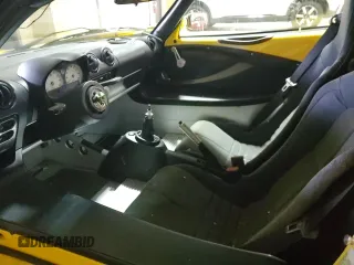 2005 Lotus Elise z VIN SCCPC11185HL33279, wystawiony jako Copart lot #87432634 z przebiegiem Nie podano mil oraz Szkody całkowita. Historia ofert i sprzedaży dostępna na DreamBid. Obrazek 7.