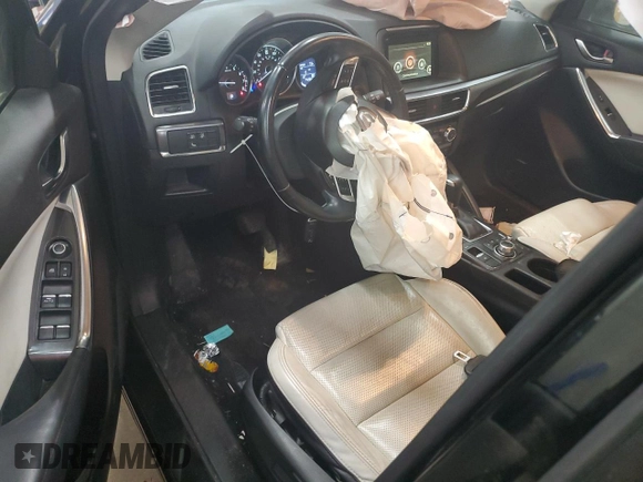 2016 Mazda CX-5 Grand Touring with VIN JM3KE4DY0G0854568, listed as a Copart auction lot 53259345 with 74,264 mi miles and Salvage Title. Bid and sale history available at carsss.com. Image 8.