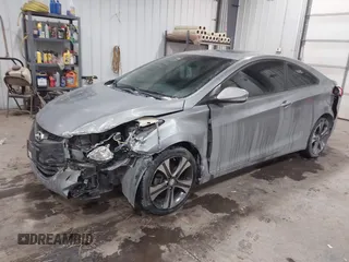 2013 Hyundai Elantra Coupe GS PZEV with VIN KMHDH6AE6DU000893, listed as a IAAI auction lot 41613994 with 94,388 mi miles. Bid and sale history available at carsss.com. Image 18.