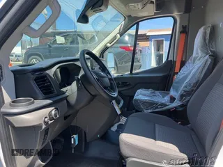2023 Ford Transit Cargo with VIN 1FTBR1X85PKC01942, listed as a IAAI auction lot 42845488 with 726 mi miles and . Bid and sale history available at DreamBid. Image 5.