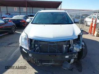 2015 Cadillac SRX with VIN 3GYFNAE34FS557297, listed as a IAAI auction lot 41388573 with 124,185 mi miles and . Bid and sale history available at DreamBid. Image 12.