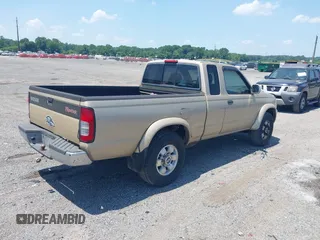 1999 Nissan Frontier XE with VIN 1N6ED26Y2XC321255, listed as a IAAI auction lot 42580192 with 147,006 mi miles and . Bid and sale history available at DreamBid. Image 4.
