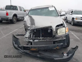2003 Toyota Tundra SR5 with VIN 5TBBT44113S350273, listed as a IAAI auction lot 40482066 with 219,831 mi miles and . Bid and sale history available at DreamBid. Image 13.