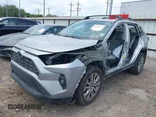 2024 Toyota RAV4 XLE Premium with VIN 2T3C1RFV2RC263246, listed as a IAAI auction lot 42156347 with 23,456 mi miles and . Bid and sale history available at DreamBid. Image 2.