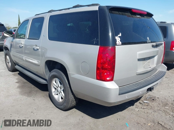 2007 GMC Yukon XL SLT with VIN 1GKFC16077R187116, listed as a IAAI auction lot 42020184 with 195,721 mi miles. Bid and sale history available at carsss.com. Image 3.
