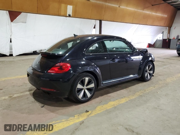 2014 Volkswagen Beetle Turbo R-Line with VIN 3VWVT7ATXEM665178, listed as a Copart auction lot 75652044 with Not Provided miles and Salvage Title. Bid and sale history available at DreamBid. Image 3.