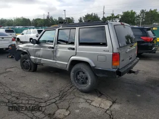 2000 Jeep Cherokee with VIN 1J4FF48S5YL172583, listed as a Copart auction lot 59605745 with 258,409 mi miles and Salvage title. Bid and sale history available at DreamBid. Image 2.