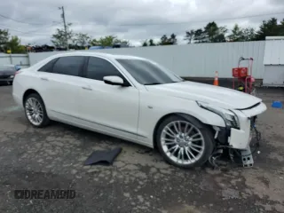 2018 Cadillac CT6 Premium Luxury AWD z VIN 1G6KG5RS0JU156753, wystawiony jako Copart lot #58171805 z przebiegiem 100 517 mil mil oraz Szkody całkowita. Historia ofert i sprzedaży dostępna na DreamBid. Obrazek 4.