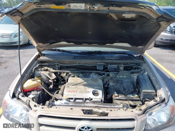 2006 Toyota Highlander with VIN JTEGP21A260095615, listed as a IAAI auction lot 41979567 with 122,904 mi miles. Bid and sale history available at carsss.com. Image 10.