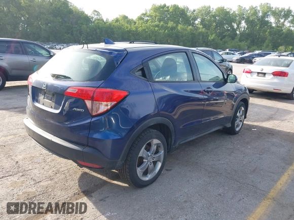 2017 Honda HR-V LX with VIN 3CZRU6H31HM703560, listed as a IAAI auction lot 42245963 with 125,818 mi miles and . Bid and sale history available at DreamBid. Image 4.