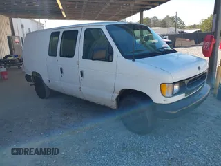 1999 Ford Econoline Cargo with VIN 1FTRE1429XHC29847, listed as a IAAI auction lot 41680406 with 262,002 mi miles. Bid and sale history available at carsss.com. Image 1.