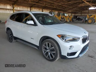2016 BMW X1 xDrive28i z VIN WBXHT3C35GP881610, wystawiony jako Copart lot #57690625 z przebiegiem 189 579 mil mil oraz Czysty tytuł • Clean title. Historia ofert i sprzedaży dostępna na DreamBid. Obrazek 4.