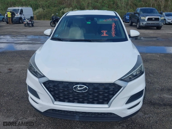 2019 Hyundai Tucson SE with VIN KM8J23A46KU048921, listed as a IAAI auction lot 40781586 with 57,186 mi miles. Bid and sale history available at carsss.com. Image 6.