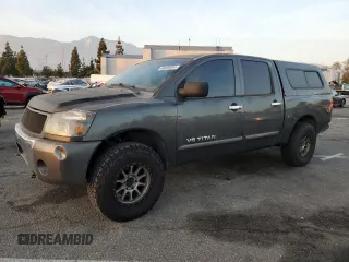 2007 Nissan Titan XE with VIN 1N6AA07A07N217705, listed as a Copart auction lot 86836804 with 272,228 mi miles and Salvage Title. Bid and sale history available at DreamBid. Image 1.
