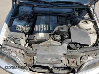 2003 BMW 3 Series 325i with VIN WBAAZ334X3PH33503, listed as a Copart auction lot 65090995 with 198,603 mi miles and Clean title. Bid and sale history available at DreamBid. Image 11.