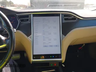 2014 Tesla Model S P85D with VIN 5YJSA1H20EFP63761, listed as a IAAI auction lot 41980472 with 109,164 mi miles and . Bid and sale history available at DreamBid. Image 18.