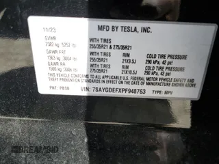 2023 Tesla Model Y Performance z VIN 7SAYGDEFXPF948763, wystawiony jako Copart lot #50562134 z przebiegiem 948 mil mil oraz Szkoda całkowita • Salvage title. Historia ofert i sprzedaży dostępna na DreamBid. Obrazek 12.