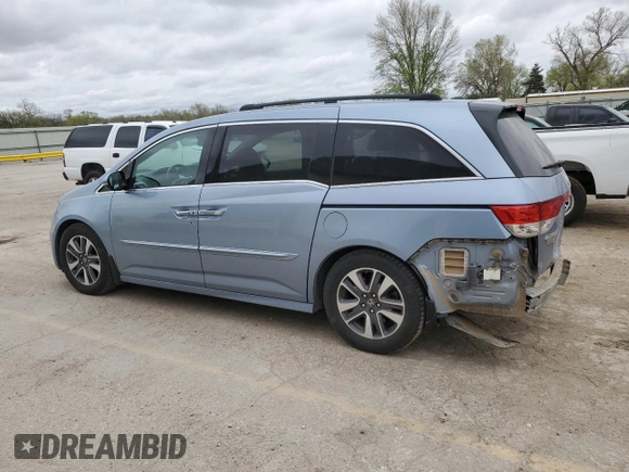 2014 Honda Odyssey Touring with VIN 5FNRL5H90EB007182, listed as a Copart auction lot 51152775 with 152,483 mi miles and Salvage title. Bid and sale history available at DreamBid. Image 2.
