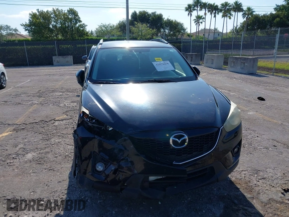 2014 Mazda CX-5 Touring with VIN JM3KE2CYXE0384987, listed as a IAAI auction lot 42052196 with 151,765 mi miles. Bid and sale history available at carsss.com. Image 6.