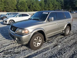 2002 Mitsubishi Montero Limited z VIN JA4LS41R32J066917, wystawiony jako Copart lot #71118894 z przebiegiem 185 475 mil mil oraz Szkody całkowita. Historia ofert i sprzedaży dostępna na DreamBid. Obrazek 1.