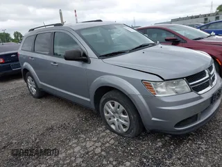 2017 Dodge Journey SE z VIN 3C4PDCAB9HT706564, wystawiony jako IAAI lot #42331339 z przebiegiem 169 447 mil mil oraz . Historia ofert i sprzedaży dostępna na DreamBid. Obrazek 1.