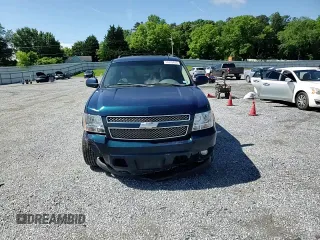 2007 Chevrolet Tahoe LTZ with VIN 1GNFC13J57R181007, listed as a Copart auction lot 56376455 with 202,161 mi miles and Salvage title. Bid and sale history available at DreamBid. Image 14.