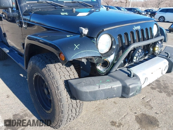 2010 Jeep Wrangler Unlimited Sahara with VIN 1J4HA5H16AL215659, listed as a IAAI auction lot 41749218 with 55,544 mi miles. Bid and sale history available at carsss.com. Image 6.