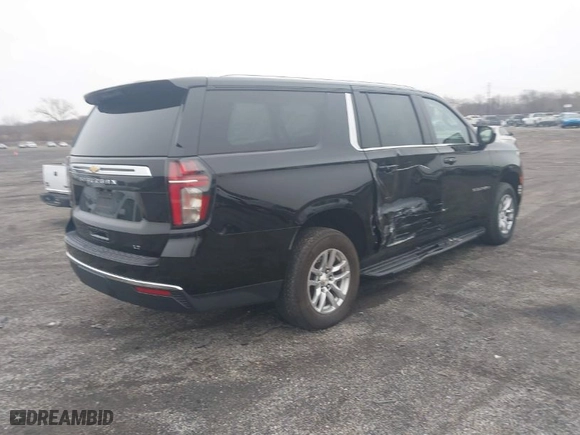 2023 Chevrolet Suburban LT with VIN 1GNSKCKD0PR129079, listed as a IAAI auction lot 41547855 with 158,820 mi miles. Bid and sale history available at carsss.com. Image 4.