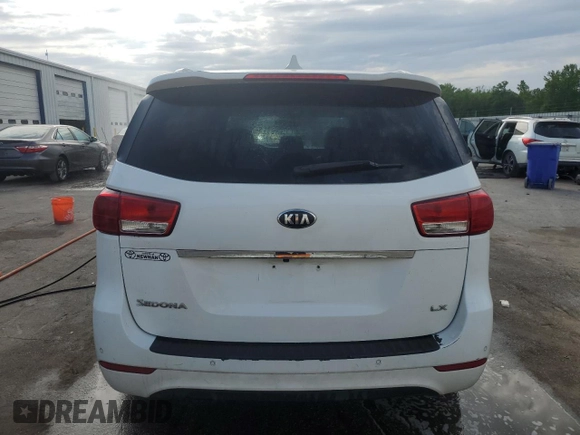 2018 Kia Sedona LX with VIN KNDMB5C12J6386786, listed as a Copart auction lot 52376775 with 140,750 mi miles and Salvage Title. Bid and sale history available at DreamBid. Image 6.