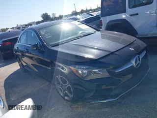 2018 Mercedes-Benz CLA with VIN WDDSJ4EBXJN650357, listed as a IAAI auction lot 35930612 with 75,371 mi miles. Bid and sale history available at carsss.com. Image 1.