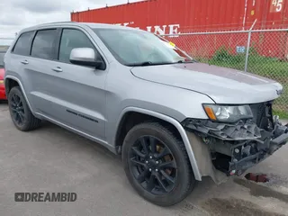 2017 Jeep Grand Cherokee Laredo with VIN 1C4RJFAG1HC701921, listed as a IAAI auction lot 42164963 with 135,039 mi miles and . Bid and sale history available at DreamBid. Image 1.